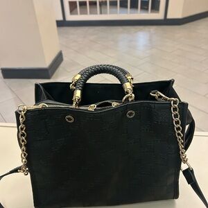 Steve Madden Elegant Black Handbag with Gold Accents Some usage-clean!